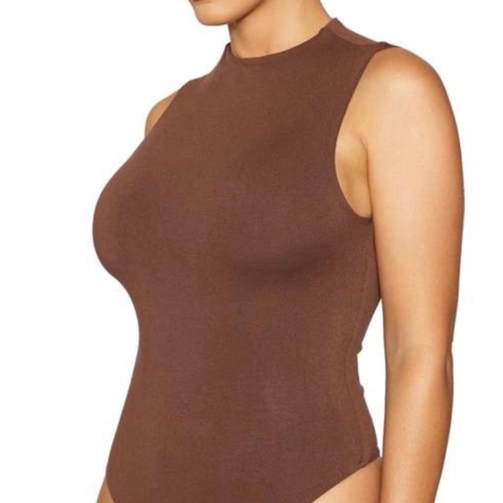 NAKED WARDROBE- Nw Sleeveless bodysuit SIZE XL